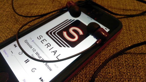An episode of the podcast Serial plays on a phone.