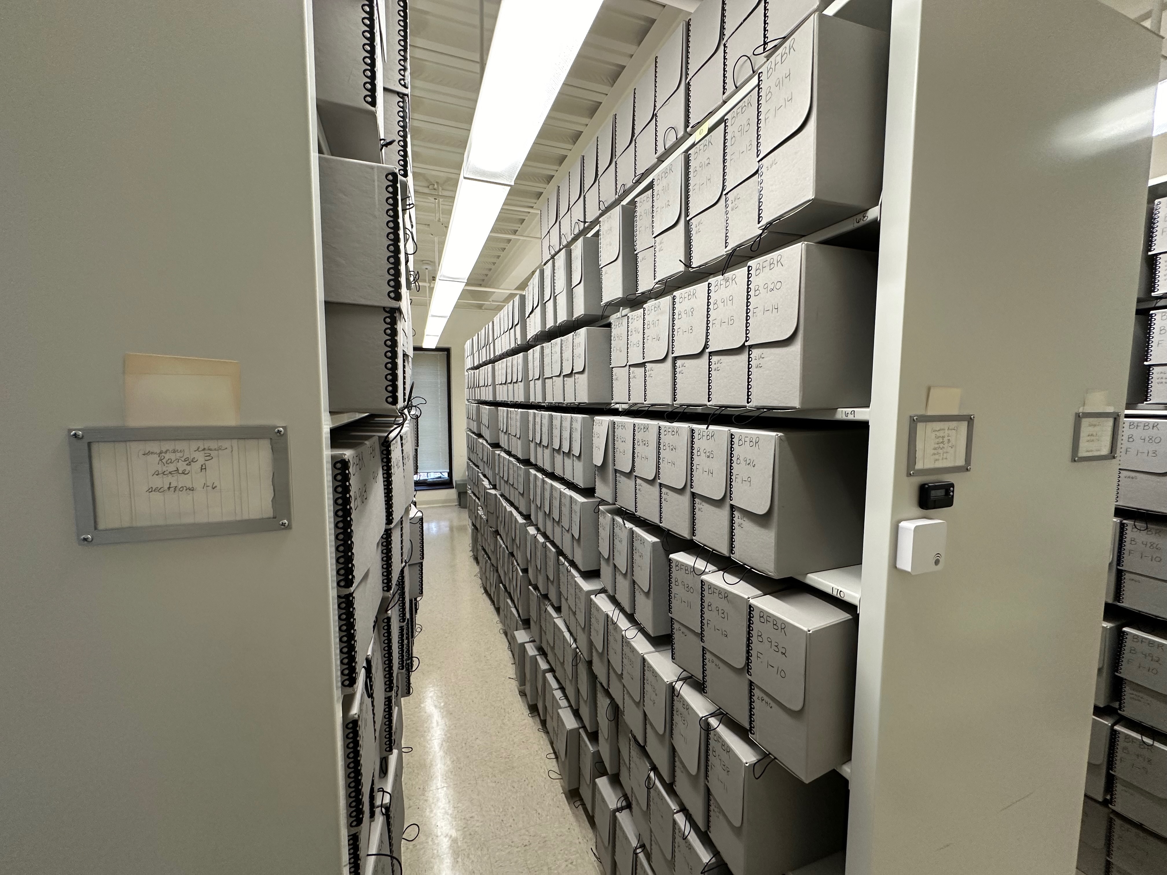 Shelves of gray archival boxes