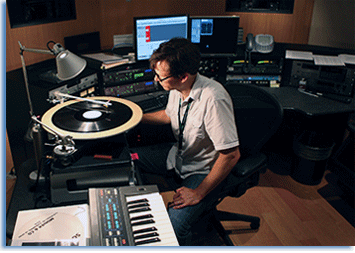 An audio engineer monitors the playback of a 16" lacquer disc. Library of Congress Photo/Abby Brack Lewis.