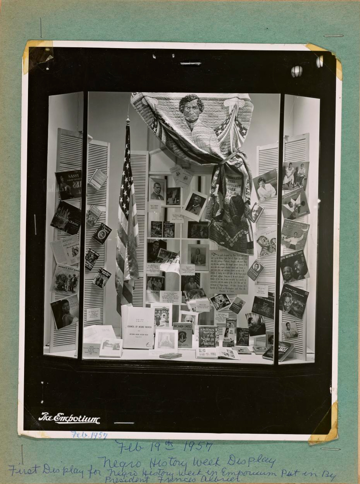 Scrapbook page compiled by Frances Albrier, president of the San Fransisco chapter of the National Council of Negro Women, documenting the group’s Negro History Week display installed at The Emporium in 1957.