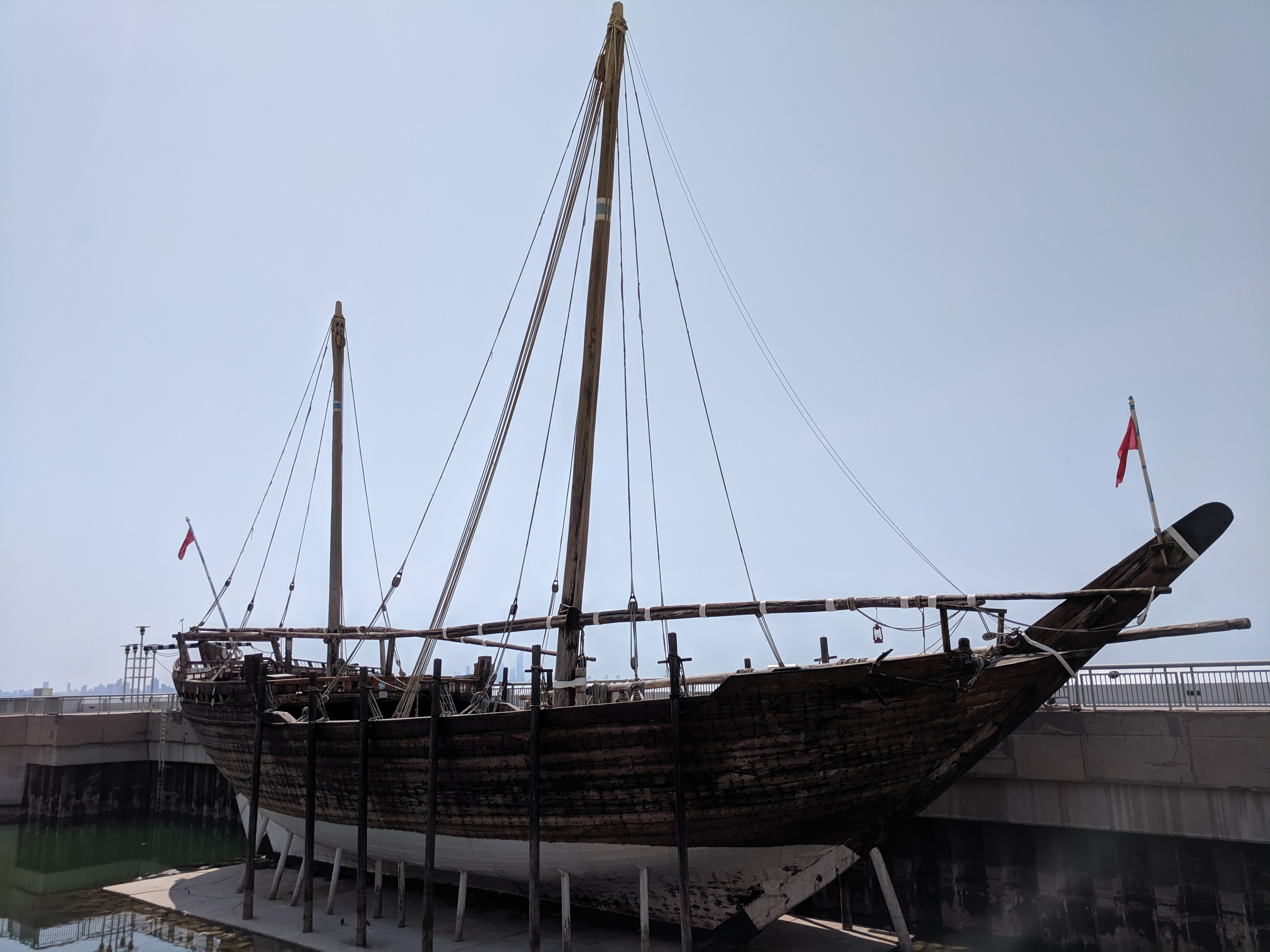Photograph of a dhow in dry dock.