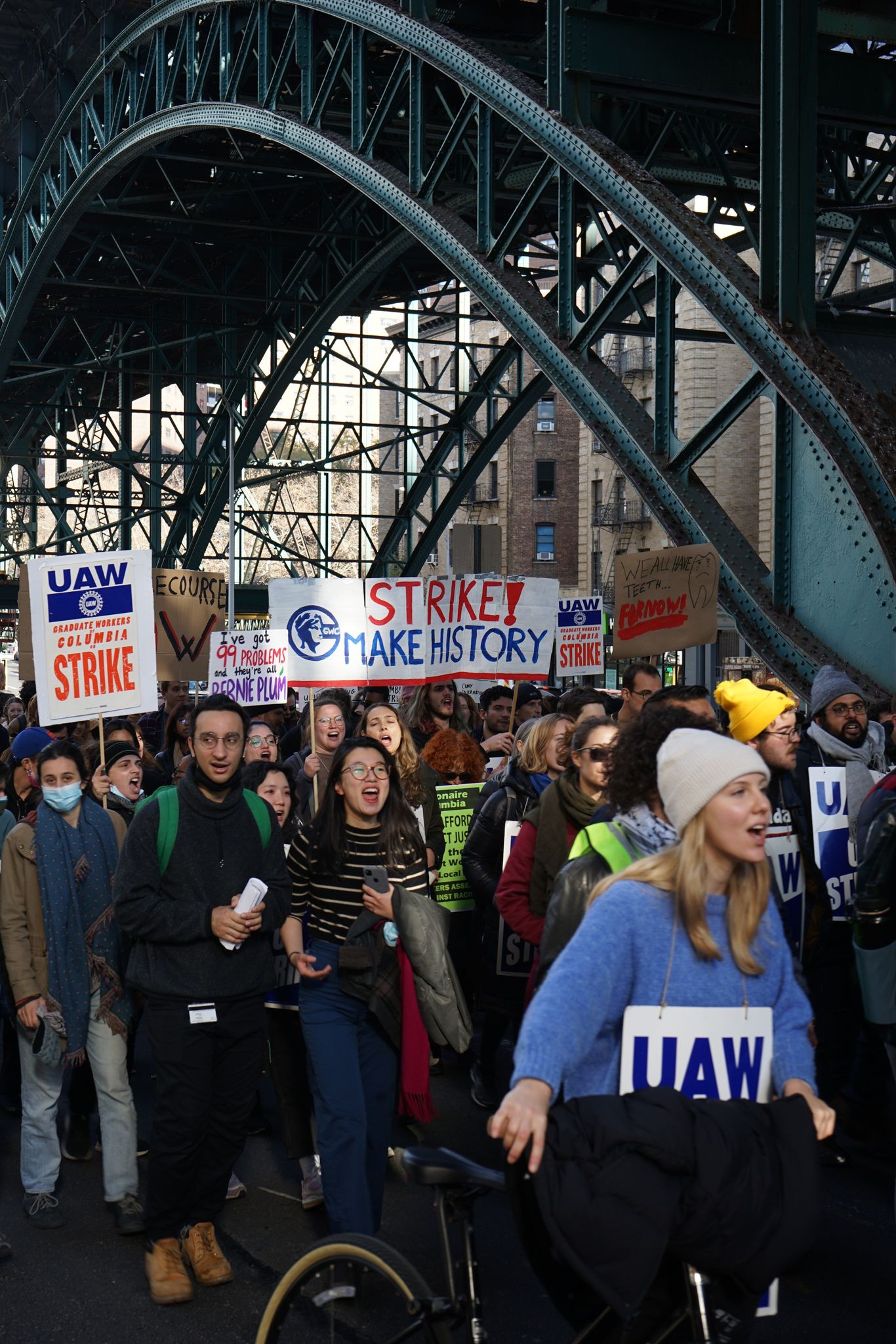 Striking student workers march through upper Manhattan.