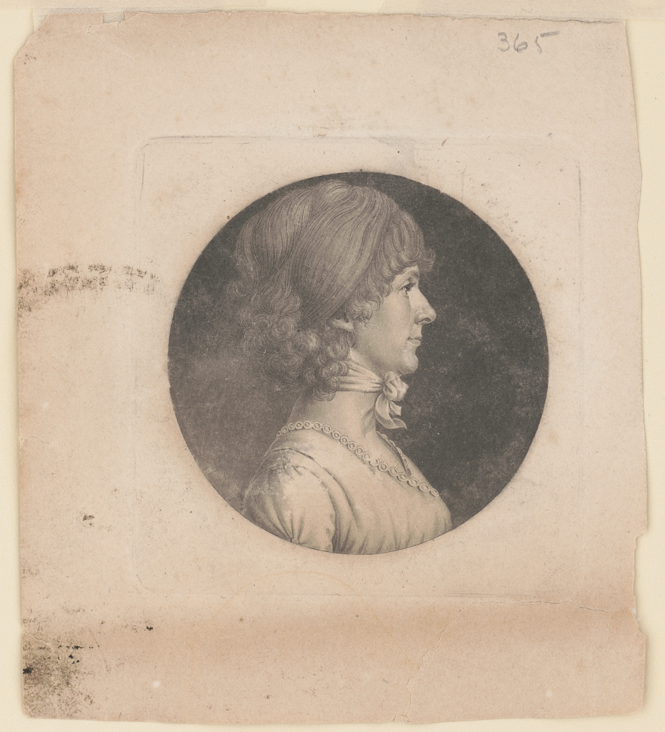 An engraving of the side profile of a white woman with her hair up wearing a neck scarf