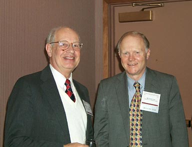 Gerhard L. Weinberg (left), one of the three winners of the Award for Scholarly Distinction, seen with Wm. Roger Louis, AHA president-elect for 2000. Photo by Miriam Hauss.