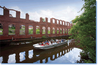 Park Tour Boat on Lower Pawtucket Canal at the Lowell National Historical Park by Jim Higgins. Courtesy of the National Park Service.
