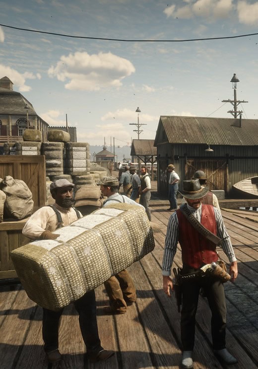 RedDeadFrontis A screen shot from the video gam Red Dead Redemption II. A cowboy in a red vest walks on a pier with people moving around behind him.