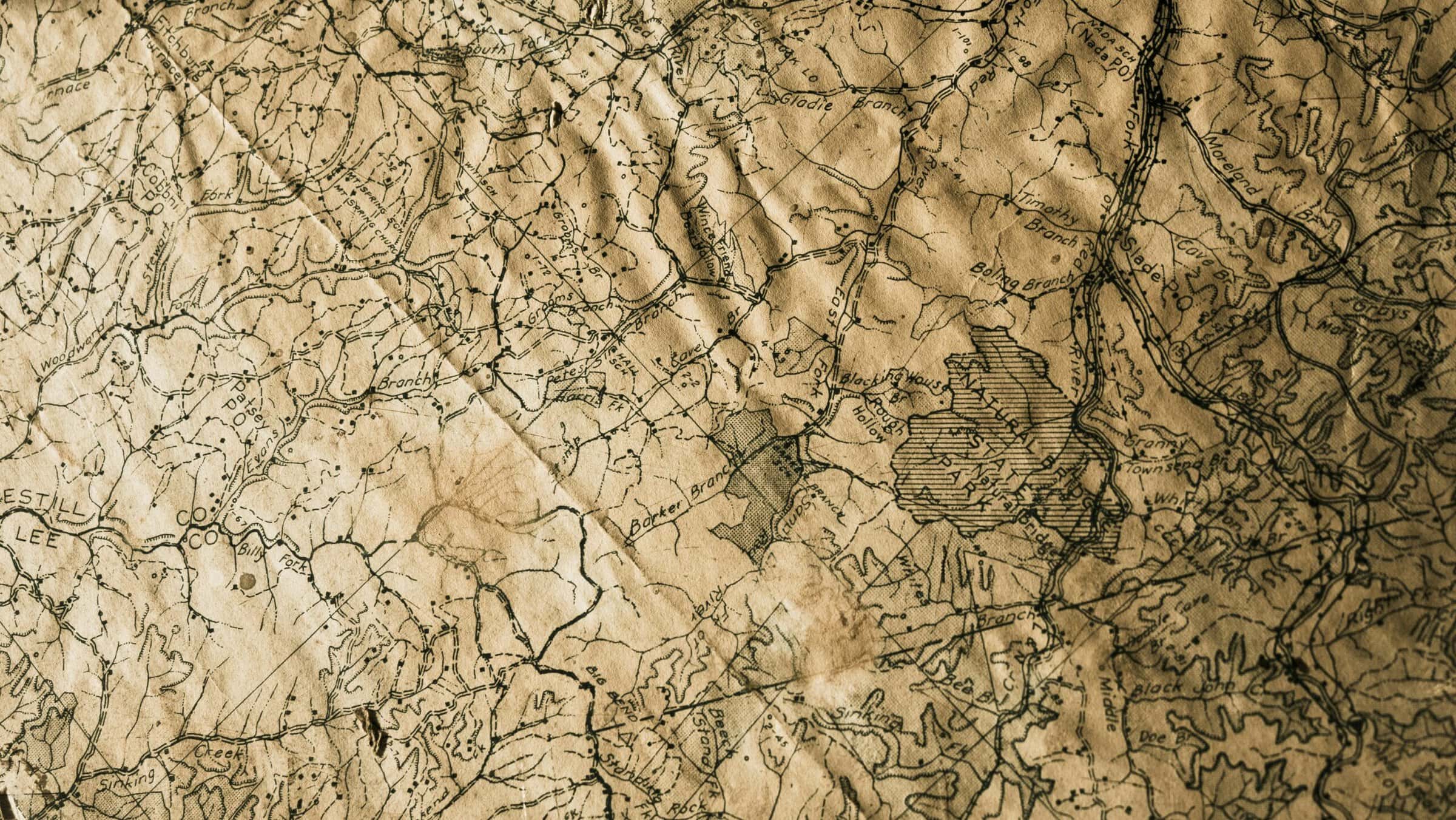 Aged, tan and black topographical map of Natural Bridge State Park in Virginia and the surrounding area.
