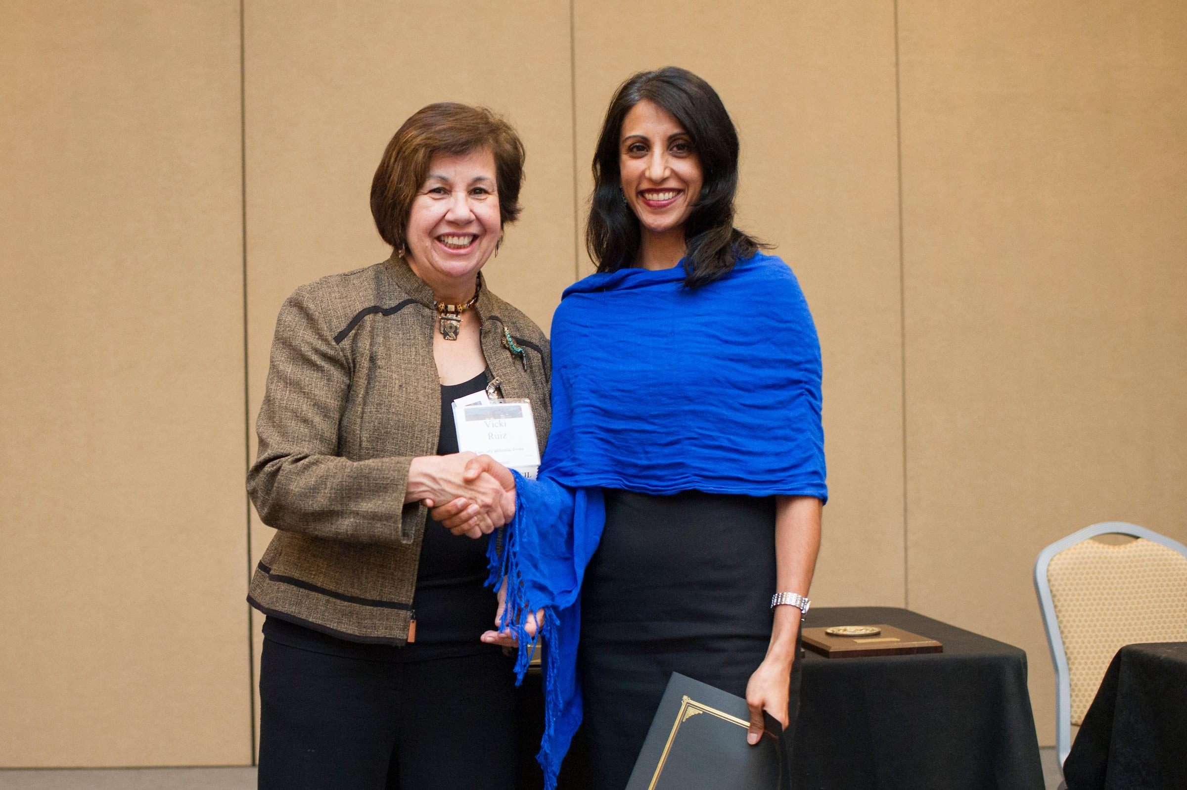 Two AHA members shaking hands