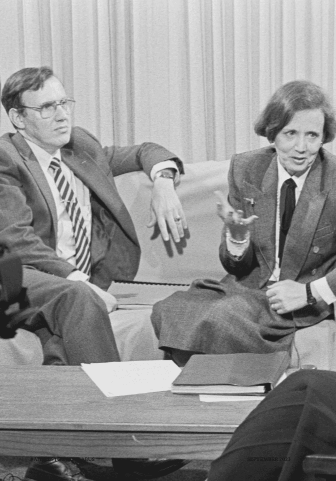 "Stephen H." (left) and "Marion L." (right), sitting on a couch and talking to an offscreen interviewer.