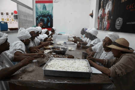 A Festa da Boa Morte, (The Afro-Catholic festival of the Good Death), Cachoeira Brazil. As Irmãs da Boa Morte, (The Sisters of the Good Death) prepare the final ceremonial meal, Caruru, 2012. © Scott Alves Barton