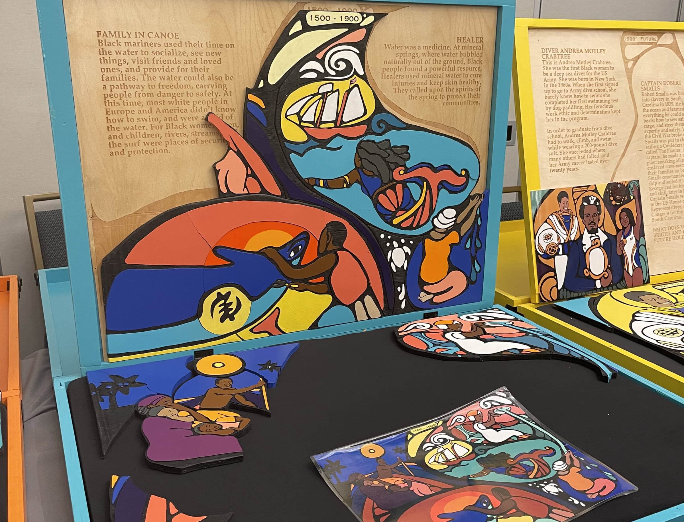 Brightly painted wooden puzzle depicting a Black family in canoe from 1500-1900.