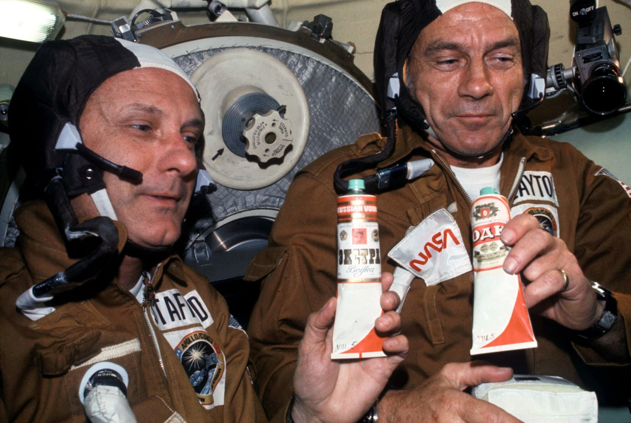 two astronauts holding Soviet space food