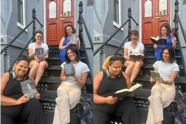 AHA staff members holding their copies of Babel on the steps of a Townhouse