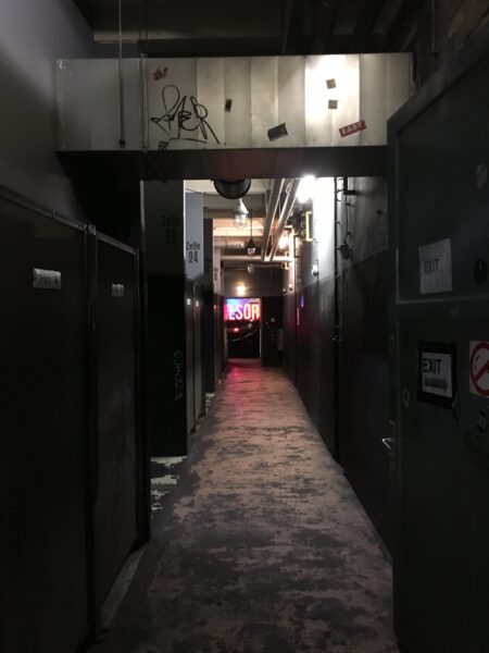 A dark corridor of a nightclub