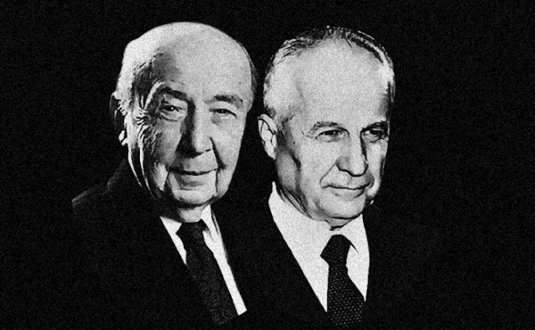 Black and white headshots of two men wearing suits.