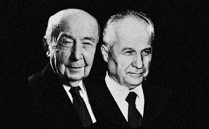 Black and white headshots of two men wearing suits.