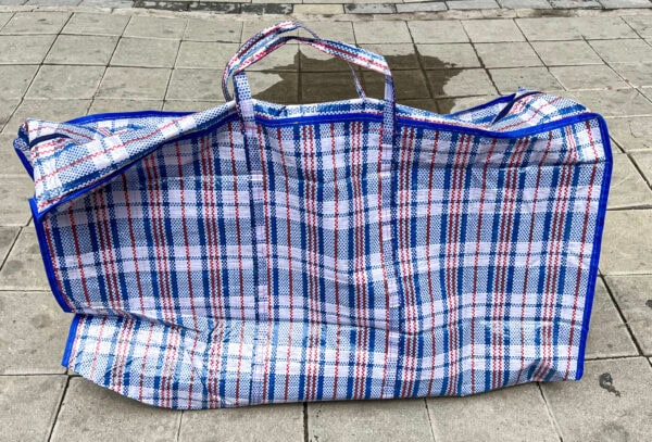 A synthetic patterned red-white-blue bag