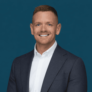 Photograph of a man, Brandon Griggs, smiling